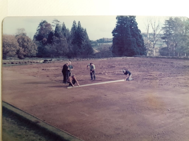 Levelling the land before seeding the first green